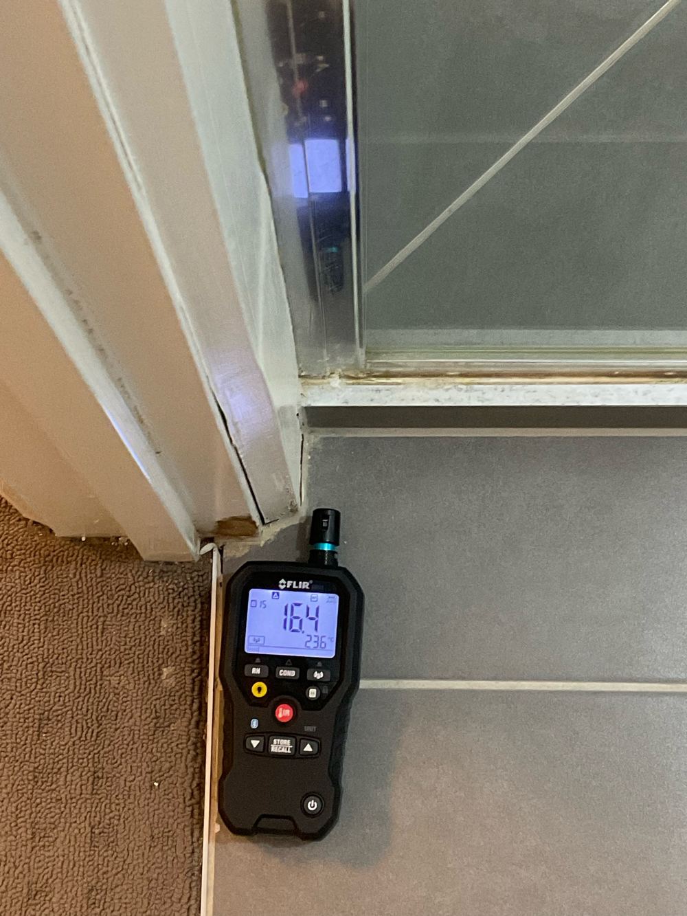 Water damage beside a shower recess that should be monitored, found during a building and pest inspection in Truganina