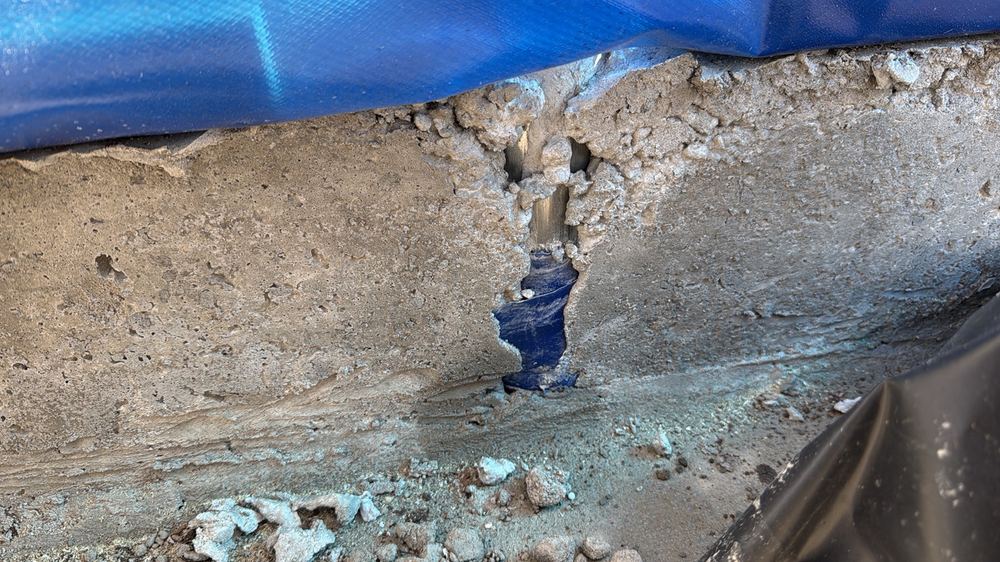 Honeycombed concrete along the slab edge, weakening it and letting water in, found during a construction stage inspection in Truganina