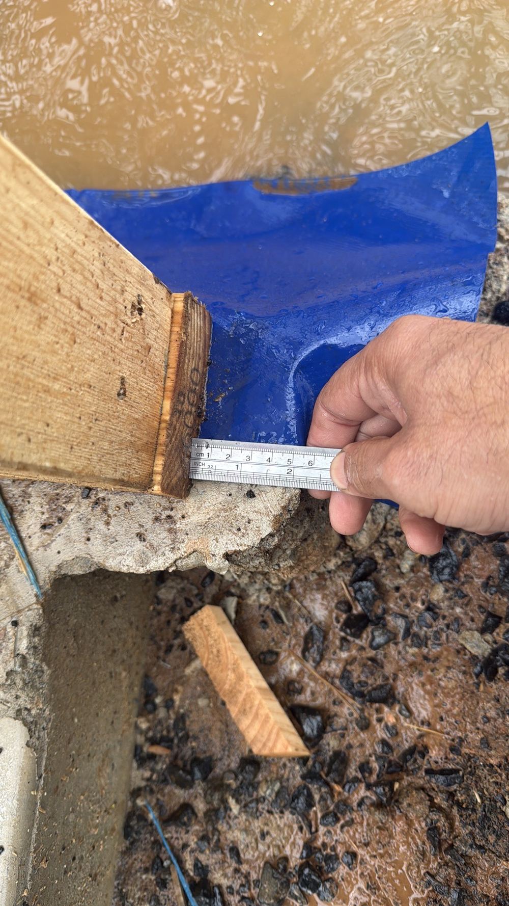 Slab edge sticking out over 20mm past the frame, narrowing the brick cavity, found during a frame inspection in Truganina