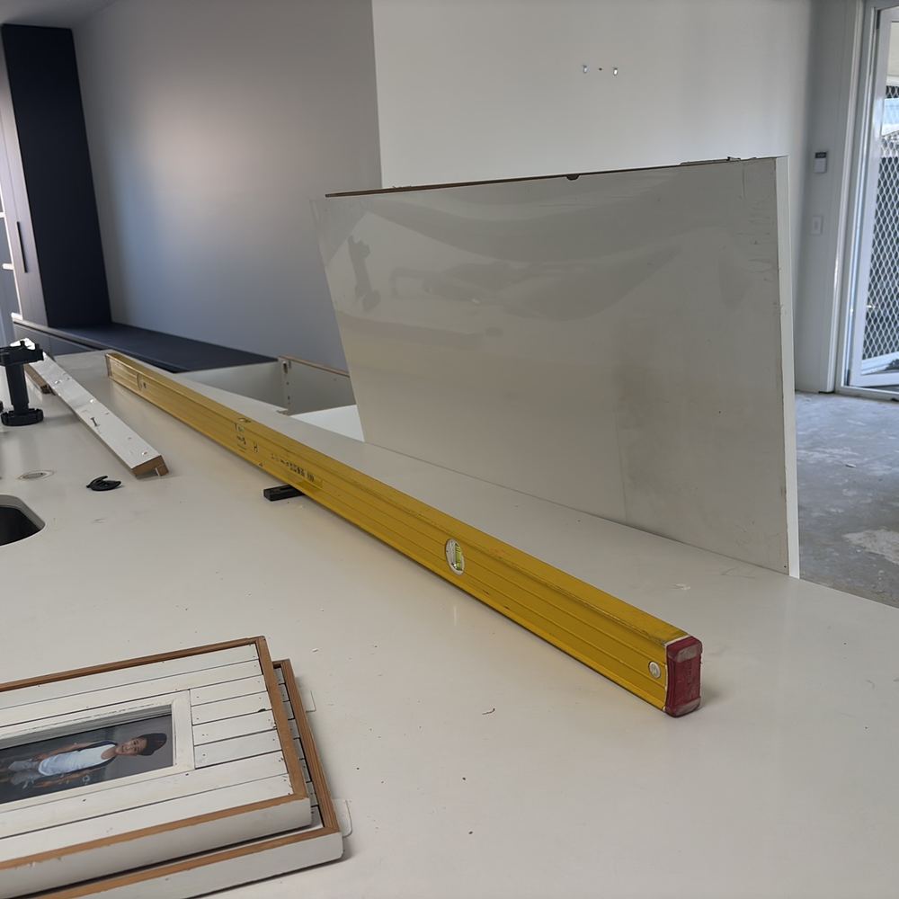 Benchtop deflection too great to flatten, so it needs replacing, found during a defect investigation inspection in Derrimut