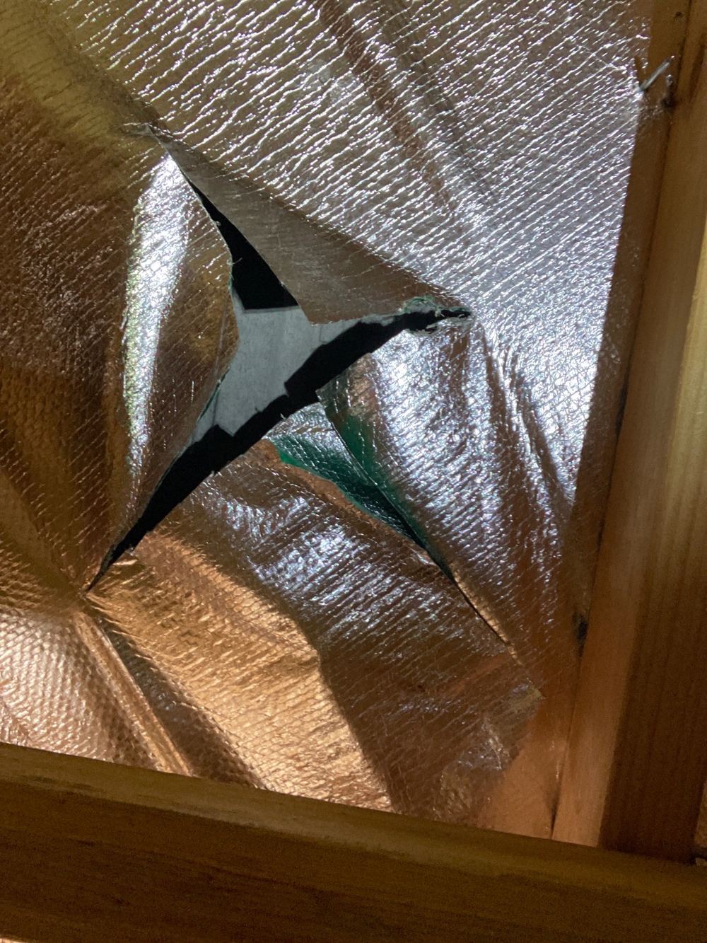Roof sarking cut or torn, removing a second line of defence against leaks, found during a PCI inspection in Truganina