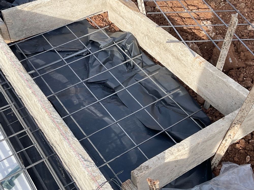 Vapour barrier pulled over the reinforcing steel instead of lying beneath it, Truganina